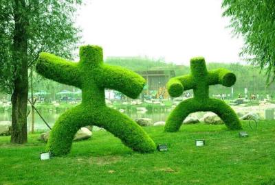 仿真绿雕价格制作稻草人工艺品城市绿雕厂家