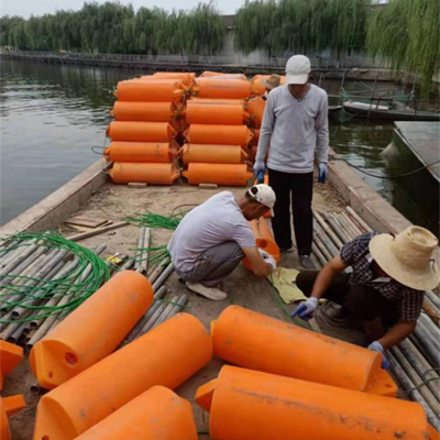 大跨度拦污浮排水电站取水口拦漂浮筒设计