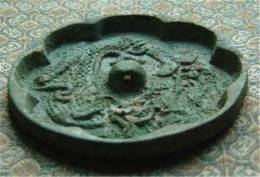 葵花龍紋銅鏡鑒定拍賣成交機(jī)構(gòu)