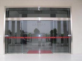 杨浦五角场自动门维修办公玻璃地弹簧安装